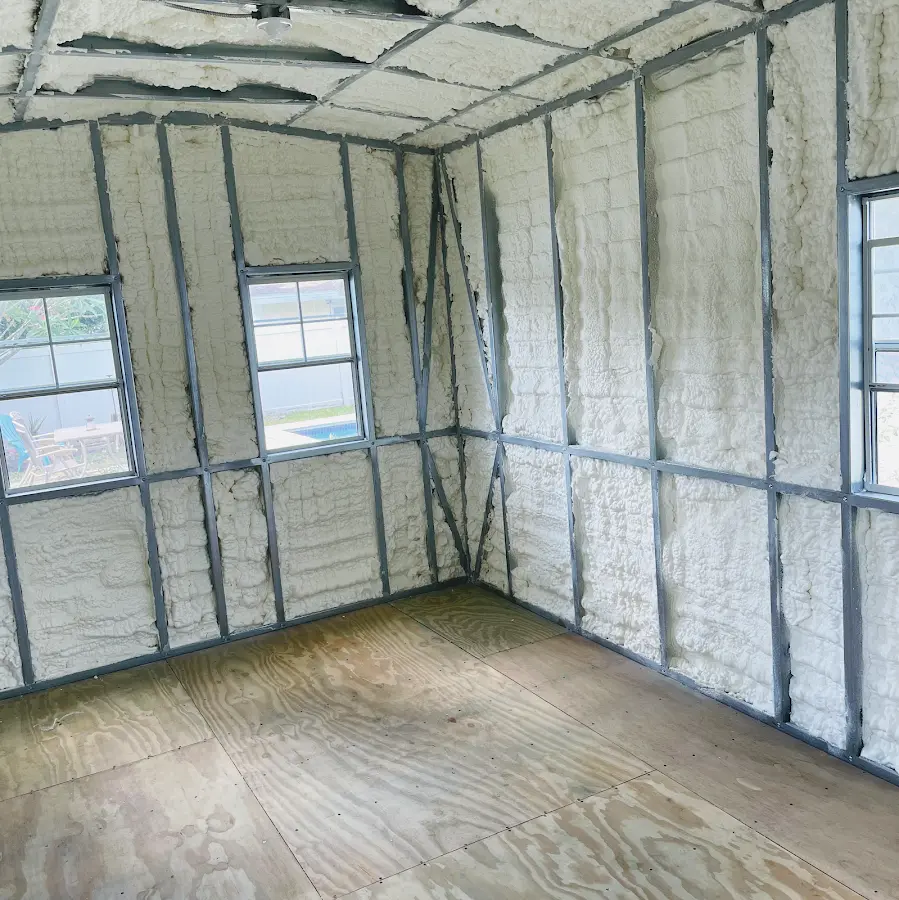 Closed-cell spray foam insulation applied to wall cavities in a residential project in Schaghticoke
